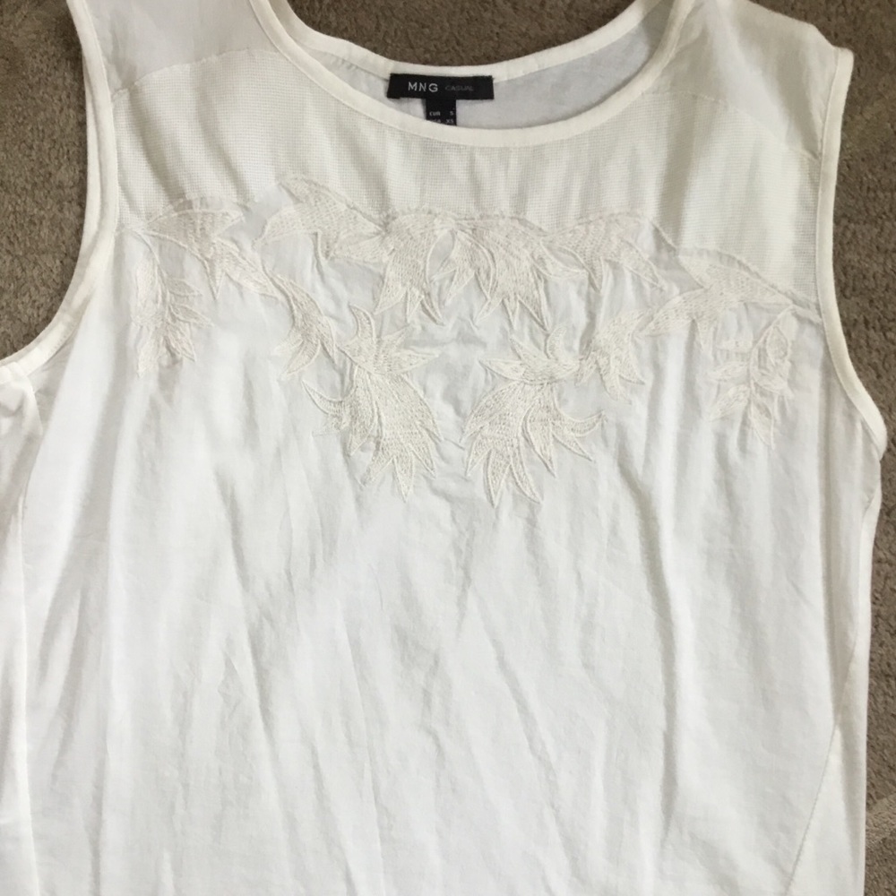 Embroidered ivory sleeveless top